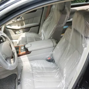 100pcs Disposable Plastic Car Seat Cover Universal Fit Protector